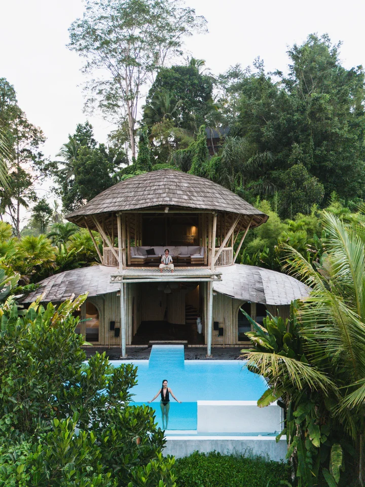 Bamboo villa and private pool surrounded by tropical forest in Bali